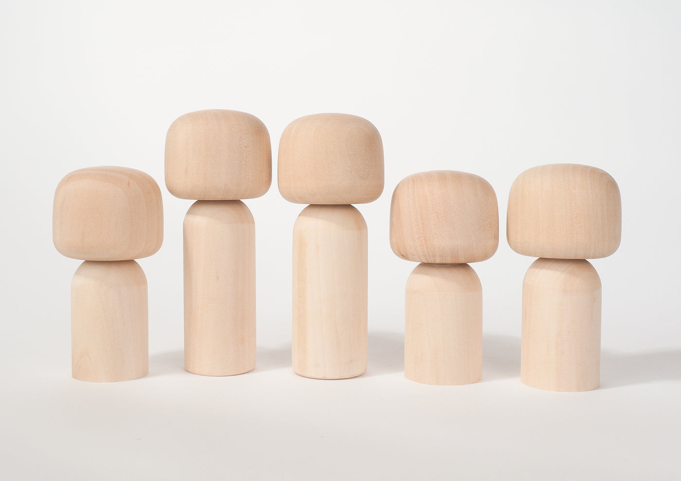 This is my Canvas. The Before and After hand-painted Family portrait, Kokeshi dolls.