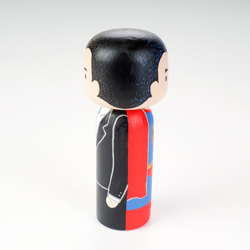 Custom super dad Kokeshi doll!  Introducing our new 2 in 1 family portrait Kokeshi dolls! 2 Designs of the same person hand-painted in 1 doll. Everyone has many roles, interests, careers, personalities, and we all wear many hats in life. Why not highlight and celebrate those in a hand-painted doll! 1 design on one side, turn the doll around and it shows another design. The toughest part is probably to choose the 2 roles you like us to paint.