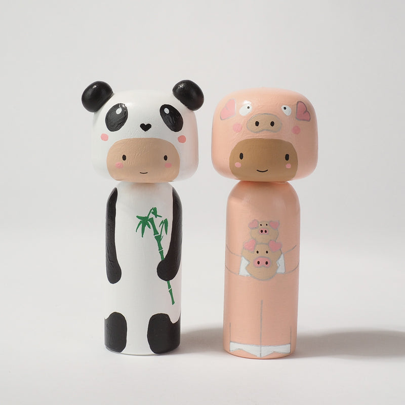Kokeshi doll in Pig costume!  This cute piggy doll will warm your heart or your someone special.  Perfect gift for anyone who are in love with piggy!   All dolls are hand-painted with love.  Collect them all, other animals are also available.