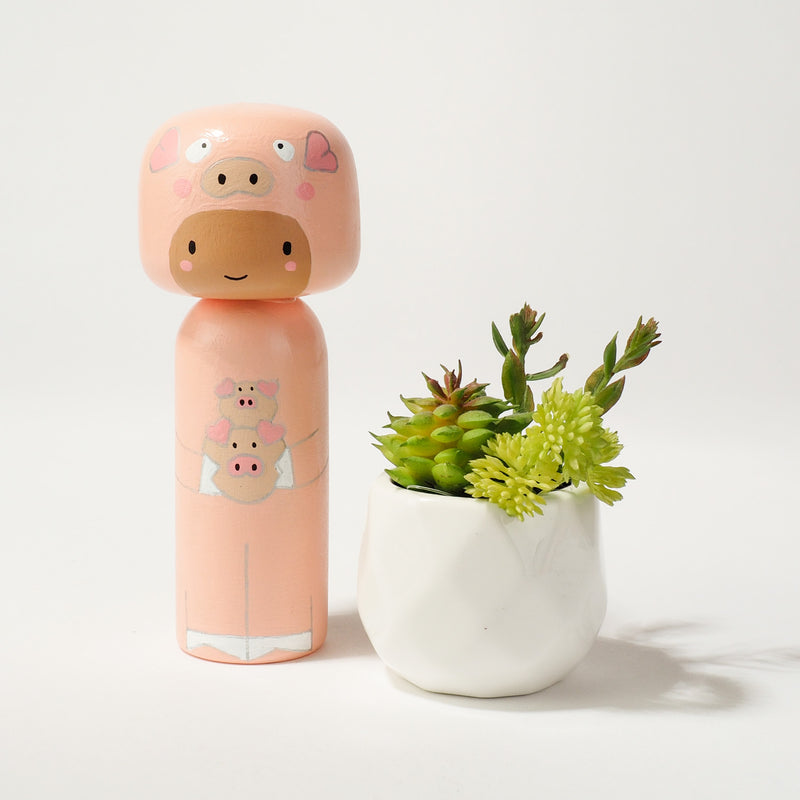 Kokeshi doll in Pig costume!  This cute piggy doll will warm your heart or your someone special.  Perfect gift for anyone who are in love with piggy!   All dolls are hand-painted with love.  Collect them all, other animals are also available.