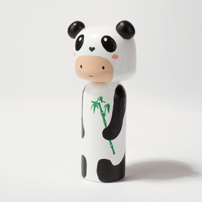 Kokeshi doll in Panda costume!  This cute panda doll will warm your heart or your special someone.  Perfect gift for anyone who are in love with panda!   All dolls are hand-painted with love.  Collect them all, other animals are also available.