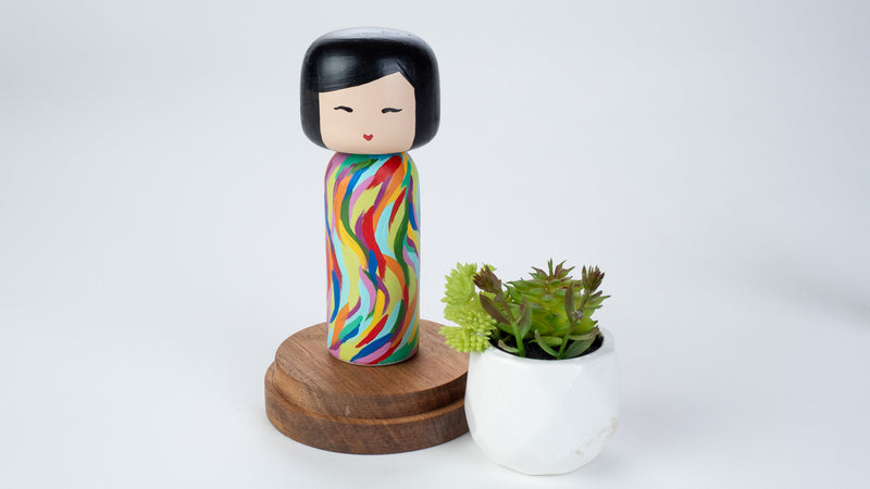 Hand-painted Japanese wooden Kokeshi doll! This cute Japanese vibrant-coloured doll will warm your heart or your someone special.  All dolls are hand-painted with love.