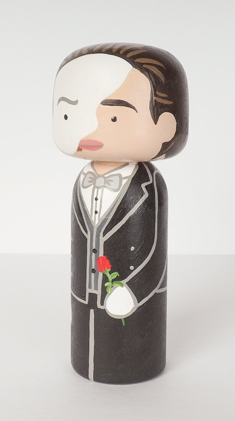Phantom of the Opera.  Hand-painted custom Kokeshi dolls!  Give something unique and personalized.  Customize your family, friends, favourite theatre character, Movies and TV shows characters, or celebrity on Kokeshi dolls!  They are hand-painted with love that show the uniqueness of each individual.
