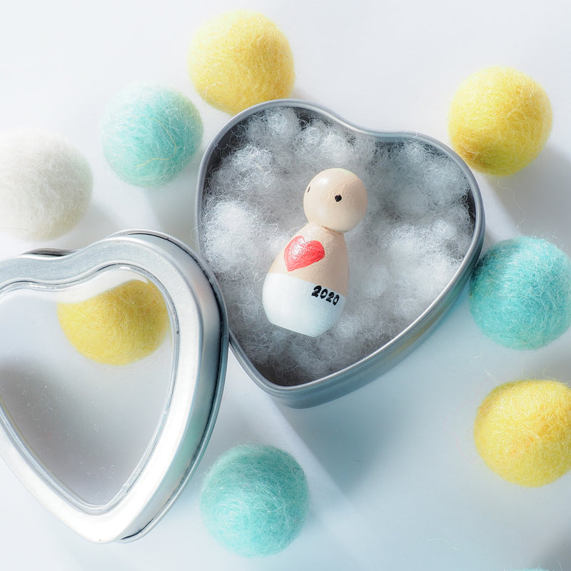 This custom baby peg doll is designed to bring comfort to parents who are grieving miscarriage and losses.