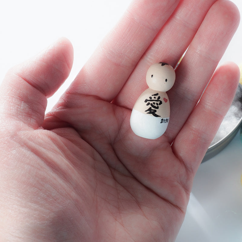 This custom baby peg doll is designed to bring comfort to parents who are grieving miscarriage and losses.