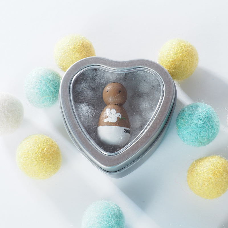 This custom baby peg doll is designed to bring comfort to parents who are grieving miscarriage and losses.