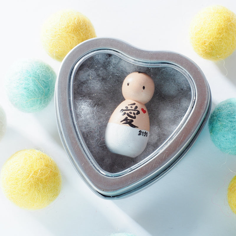 This custom baby peg doll is designed to bring comfort to parents who are grieving miscarriage and losses.