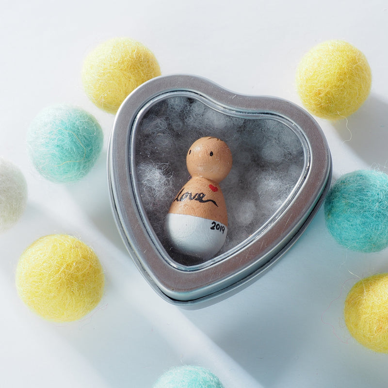 This custom baby peg doll is designed to bring comfort to parents who are grieving miscarriage and losses.