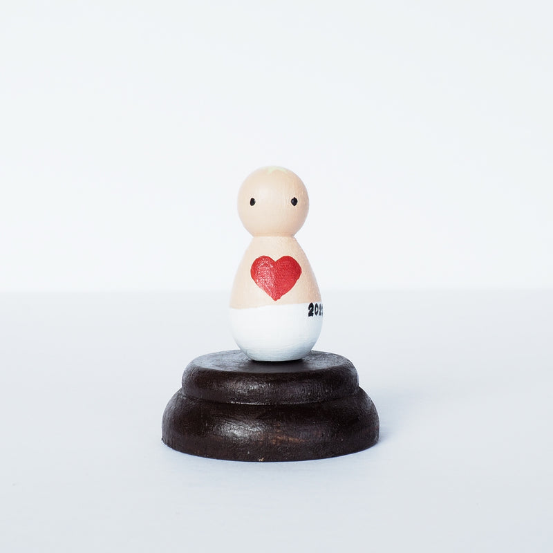 This custom baby peg doll is designed to bring comfort to parents who are grieving miscarriage and losses.