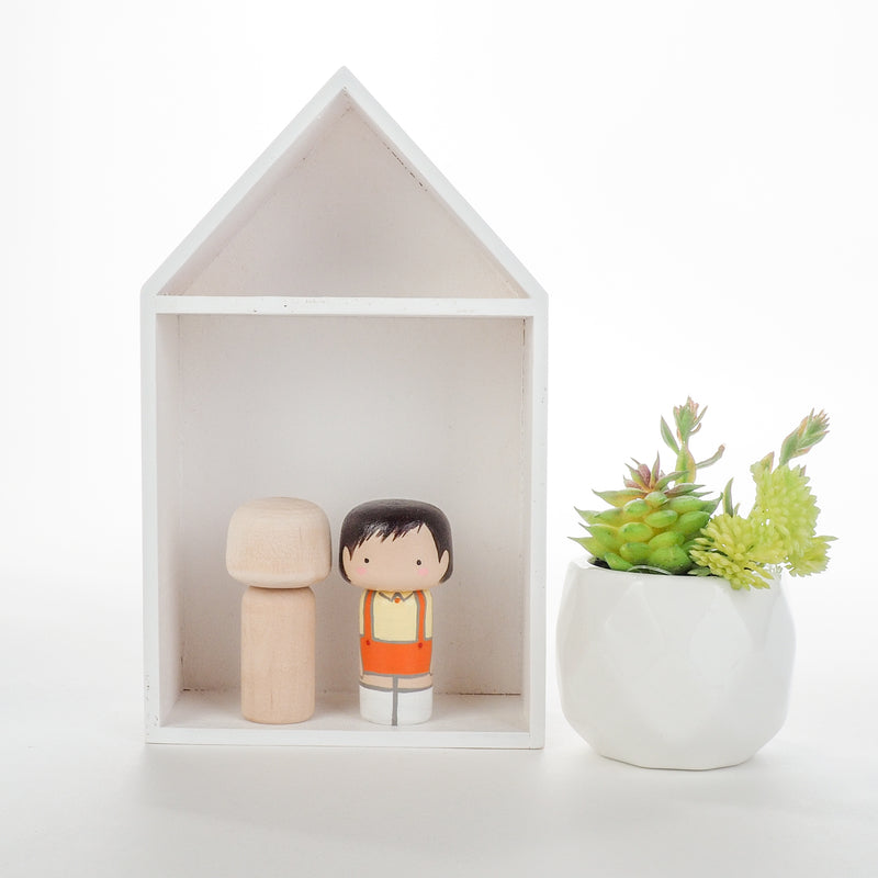 Give something unique and personalized.  Custom peg dolls of your family!  They are hand-painted that show the uniqueness of each individual in your family.  This will definitely touch the heart and bring smiles, may be even happy tears to your family.
