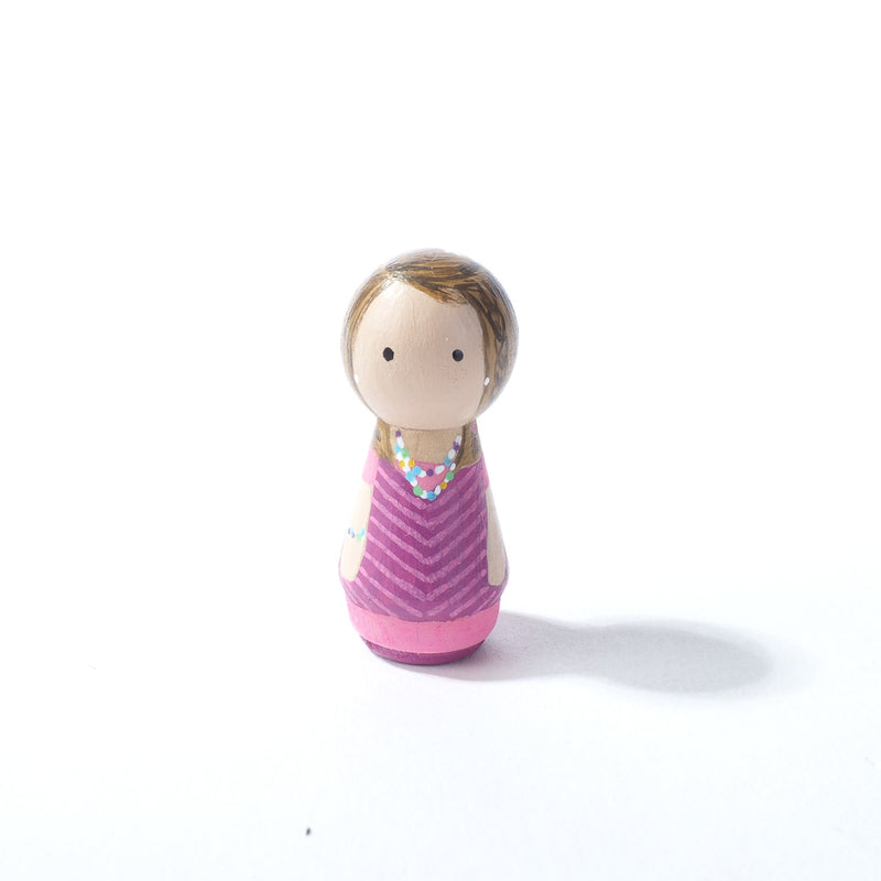 Give something unique and personalized.  Custom peg dolls of your family!  They are hand-painted that show the uniqueness of each individual in your family.  This will definitely touch the heart and bring smiles, may be even happy tears to your family.   These are great for parent's gifts, grandparent’s gifts, birthdays, anniversary gifts, couples’ gifts, or any other occasions.
