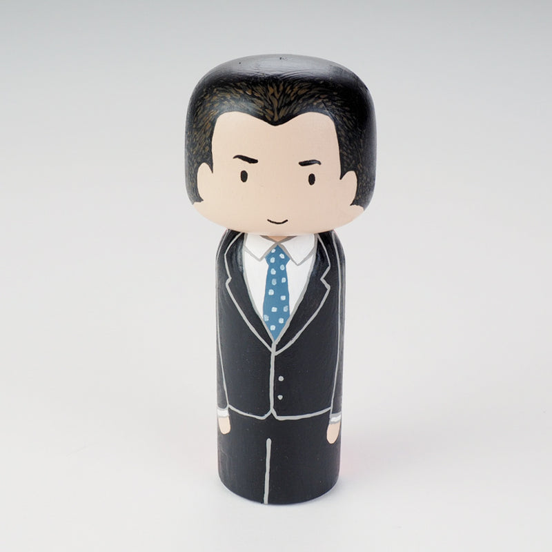 Custom super dad Kokeshi doll!  Introducing our new 2 in 1 family portrait Kokeshi dolls! 2 Designs of the same person hand-painted in 1 doll. Everyone has many roles, interests, careers, personalities, and we all wear many hats in life. Why not highlight and celebrate those in a hand-painted doll! 1 design on one side, turn the doll around and it shows another design. The toughest part is probably to choose the 2 roles you like us to paint.