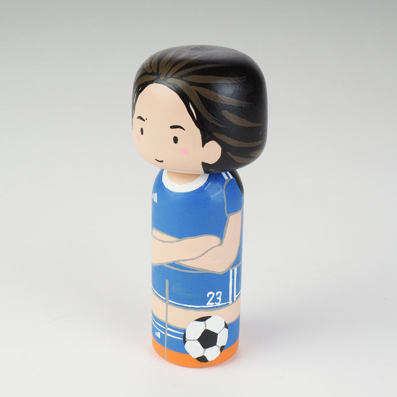 Introducing our new family portrait Kokeshi dolls!  Give something unique and personalized.  Customize your family, friends, or colleagues on Kokeshi dolls!  They are hand-painted with love that show the uniqueness of each individual such as specific sports or hobby.  Here is a family member who loves soccer but we can customize any sports.