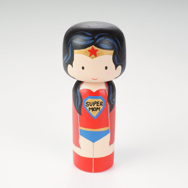 Custom super mom doll! Introducing our new 2 in 1 family portrait Kokeshi dolls! 2 Designs of the same person hand-painted in 1 doll. Everyone has many roles, interests, careers, personalities, and we all wear many hats in life. Why not highlight and celebrate those in a hand-painted doll! 1 design on one side, turn the doll around and it shows another design. The toughest part is probably to choose the 2 roles you like us to paint.