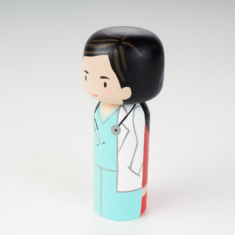 Custom super mom doll! Introducing our new 2 in 1 family portrait Kokeshi dolls! 2 Designs of the same person hand-painted in 1 doll. Everyone has many roles, interests, careers, personalities, and we all wear many hats in life. Why not highlight and celebrate those in a hand-painted doll! 1 design on one side, turn the doll around and it shows another design. The toughest part is probably to choose the 2 roles you like us to paint.