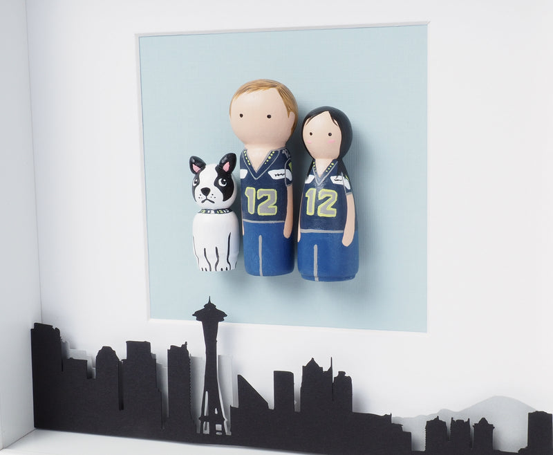 Give something unique and personalized. Custom peg dolls of your family! They are hand-painted that show the uniqueness of each individual in your family. A 9"x9" white shadow frame is included with the city landscape of your hometown! This will definitely touch the heart and bring smiles, may be even happy tears of your loved ones.  These are great for parents, grandparent’s gifts, birthdays, anniversary gifts, couples’ gifts, or any other occasions.
