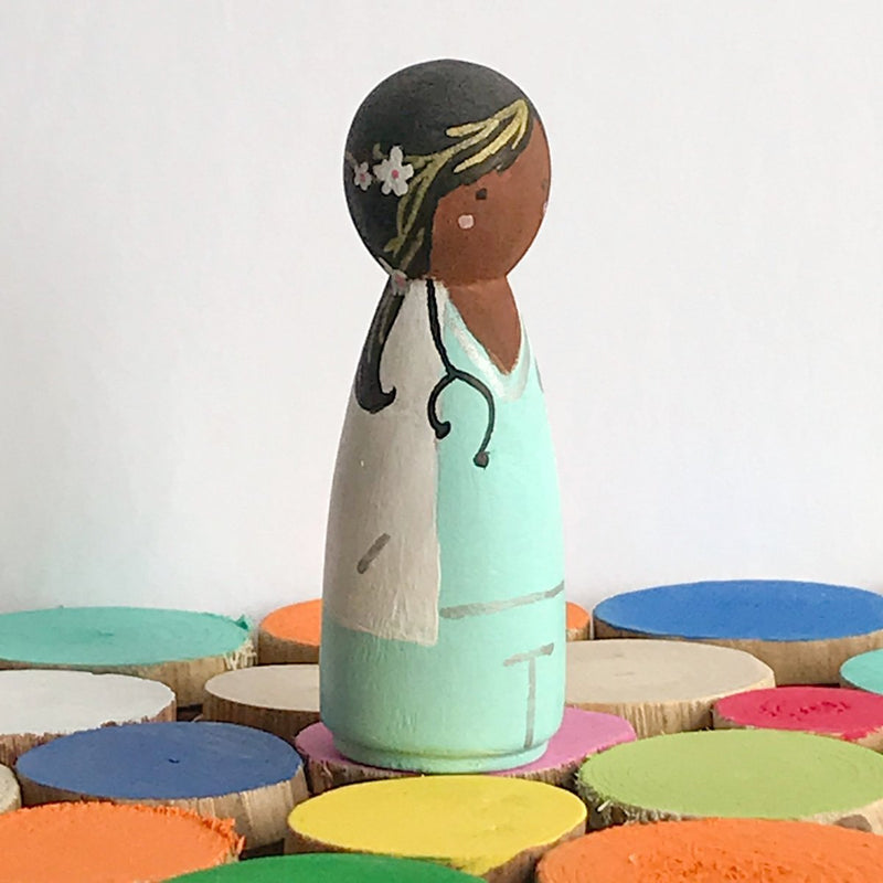 Occupational gift - Doctor Peg dolls. Give something unique and personalized.  Custom peg dolls of your family, friends, or colleagues!  They are hand-painted that show the uniqueness of each individual with their hobbies or occupations.  This will definitely touch the heart and bring smiles.  These are great for birthdays, anniversary, parent's gifts, grandparent’s gifts, retirement, graduations, communion, colleague’s going away gift, or any other occasions.