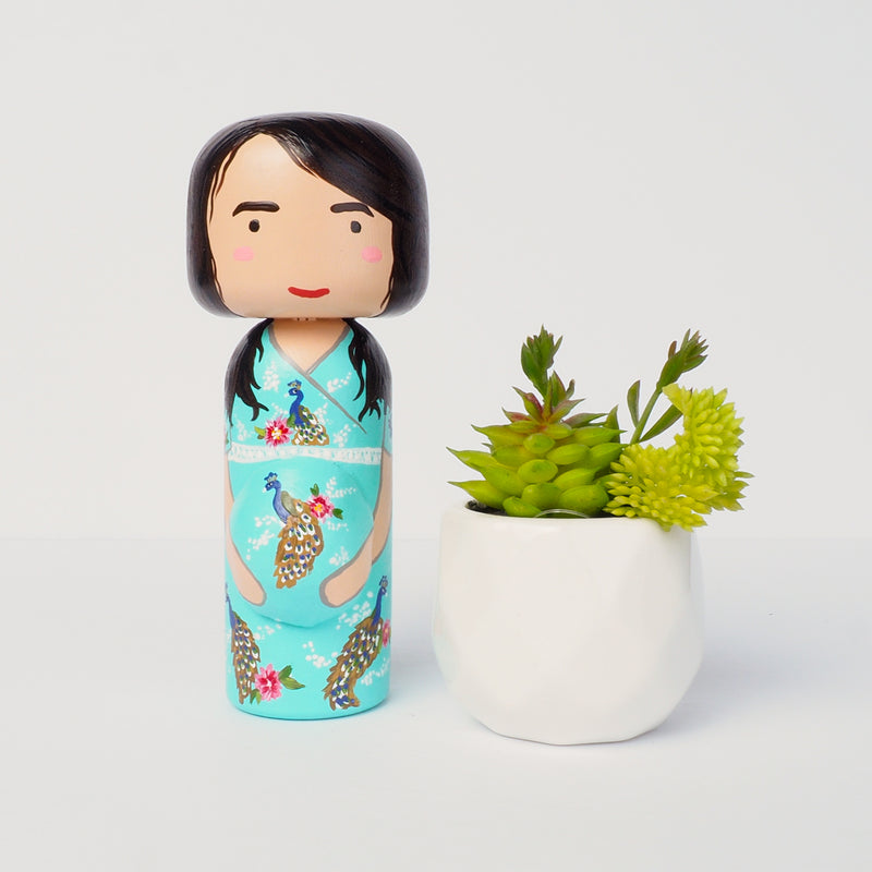Introducing our pregnant portrait Kokeshi dolls!  Give something unique and personalized.  Customize your family, friends, or colleagues on Kokeshi dolls!  They are hand-painted with love that show the uniqueness of each individual. 