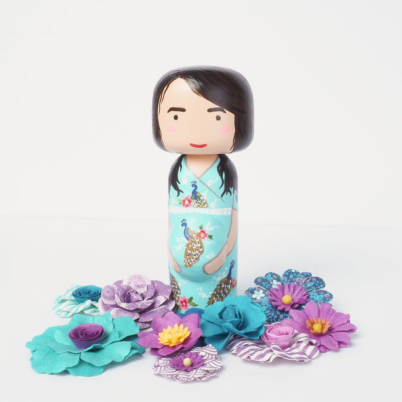 Introducing our pregnant portrait Kokeshi dolls!  Give something unique and personalized.  Customize your family, friends, or colleagues on Kokeshi dolls!  They are hand-painted with love that show the uniqueness of each individual. 