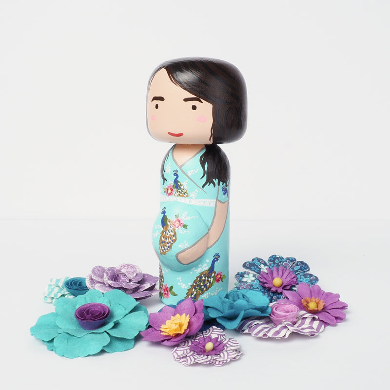 Introducing our pregnant portrait Kokeshi dolls!  Give something unique and personalized.  Customize your family, friends, or colleagues on Kokeshi dolls!  They are hand-painted with love that show the uniqueness of each individual. 