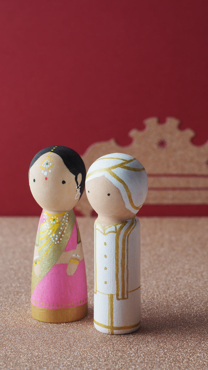 Customized wedding cake topper!  These cute peg dolls show the unique sides of you and your partner.  A great touch of personality to your wedding.  They will WOW your guests.  Also, what a great keepsake it would be!  These are also great for anniversary gifts, couples’ gifts, bridal showers, or any other occasions.