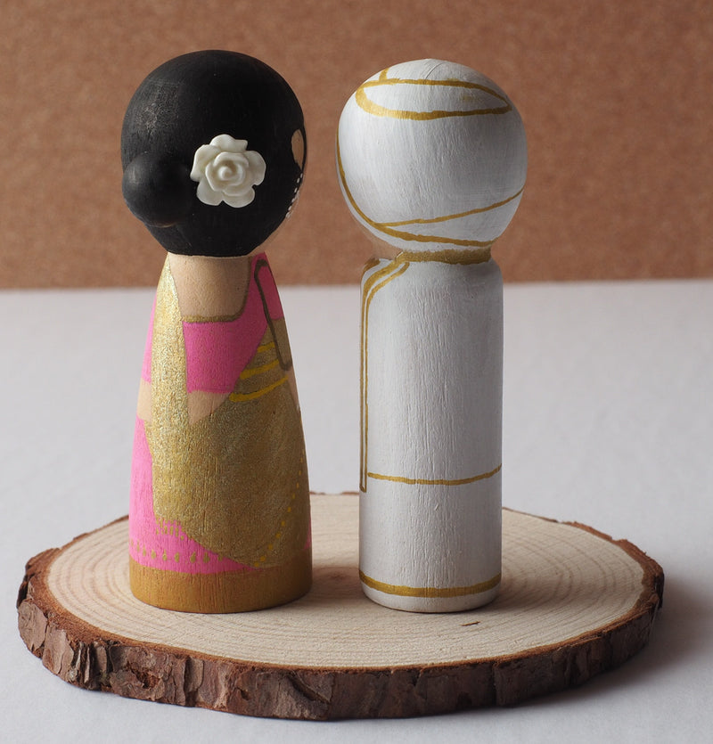 Customized wedding cake topper!  These cute peg dolls show the unique sides of you and your partner.  A great touch of personality to your wedding.  They will WOW your guests.  Also, what a great keepsake it would be!  These are also great for anniversary gifts, couples’ gifts, bridal showers, or any other occasions.