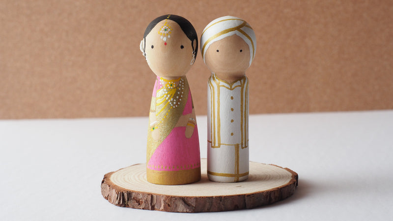 Customized wedding cake topper!  These cute peg dolls show the unique sides of you and your partner.  A great touch of personality to your wedding.  They will WOW your guests.  Also, what a great keepsake it would be!  These are also great for anniversary gifts, couples’ gifts, bridal showers, or any other occasions.