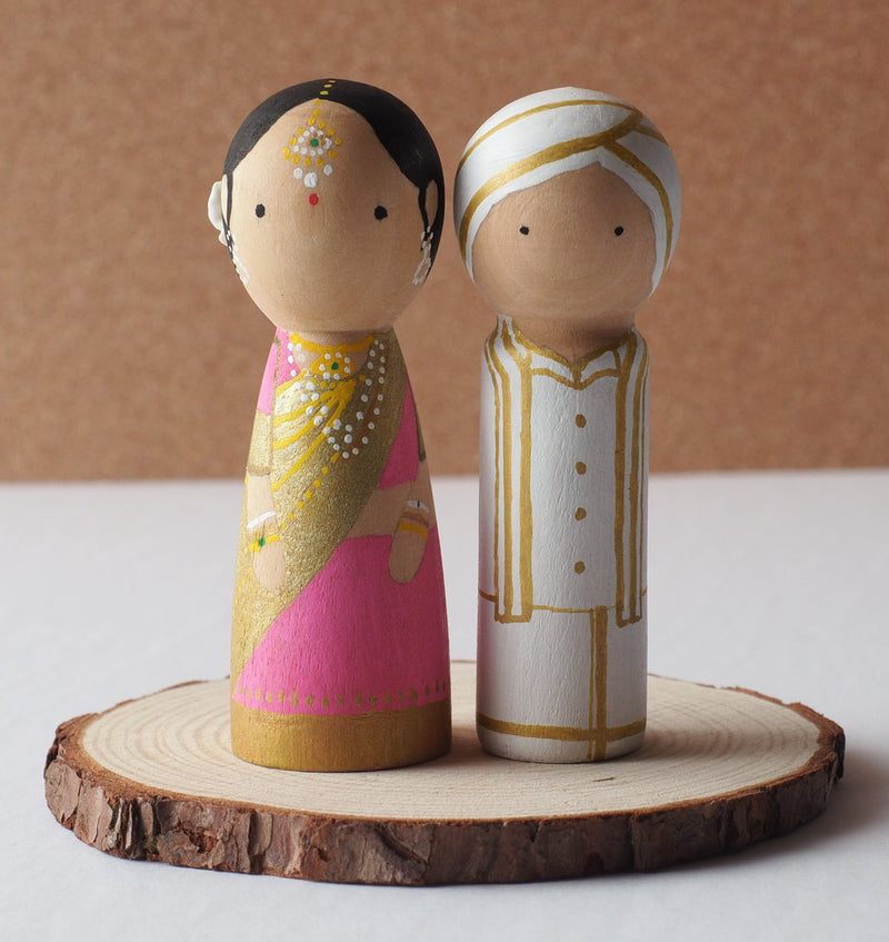 Customized wedding cake topper!  These cute peg dolls show the unique sides of you and your partner.  A great touch of personality to your wedding.  They will WOW your guests.  Also, what a great keepsake it would be!  These are also great for anniversary gifts, couples’ gifts, bridal showers, or any other occasions.