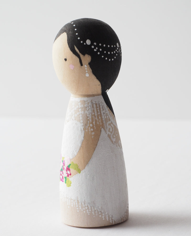 Customized wedding cake topper!  These cute peg dolls show the unique sides of you and your partner.  A great touch of personality to your wedding.  They will WOW your guests.  Also, what a great keepsake it would be!