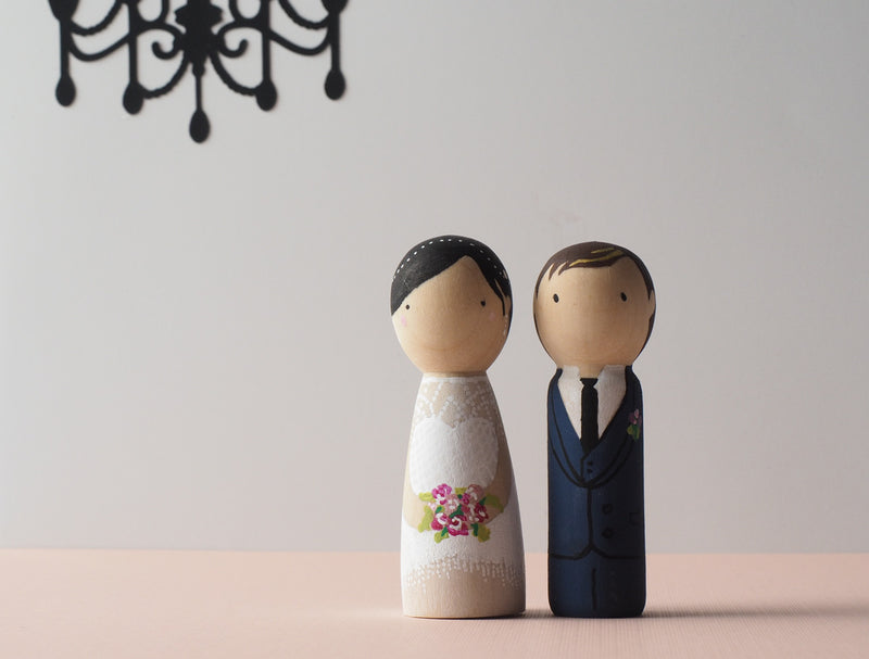 Customized wedding cake topper!  These cute peg dolls show the unique sides of you and your partner.  A great touch of personality to your wedding.  They will WOW your guests.  Also, what a great keepsake it would be!