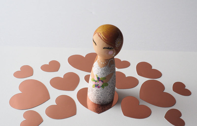 Customized wedding cake topper!  These cute peg dolls show the unique sides of you and your partner.  A great touch of personality to your wedding.  They will WOW your guests.  Also, what a great keepsake it would be!  These are also great for anniversary gifts, couples’ gifts, bridal showers, or any other occasions.