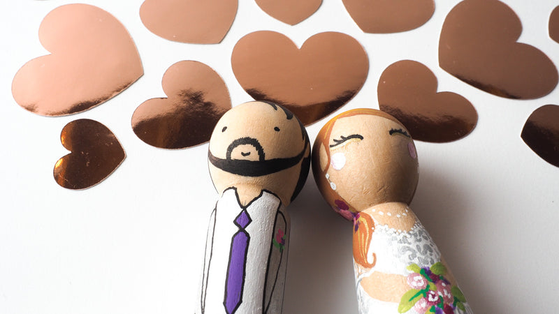 Customized wedding cake topper!  These cute peg dolls show the unique sides of you and your partner.  A great touch of personality to your wedding.  They will WOW your guests.  Also, what a great keepsake it would be!  These are also great for anniversary gifts, couples’ gifts, bridal showers, or any other occasions.