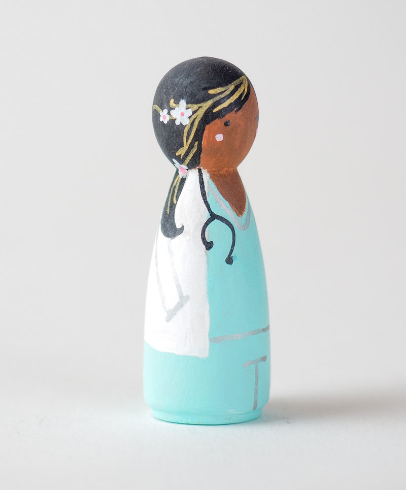 Occupational gift - Doctor Peg Dolls.  Give something unique and personalized.  Custom peg dolls of your family, friends, or colleagues!  They are hand-painted that show the uniqueness of each individual with their hobbies or occupations.  This will definitely touch the heart and bring smiles.  These are great for birthdays, anniversary, parent's gifts, grandparent’s gifts, retirement, graduations, communion, colleague’s going away gift, or any other occasions.
