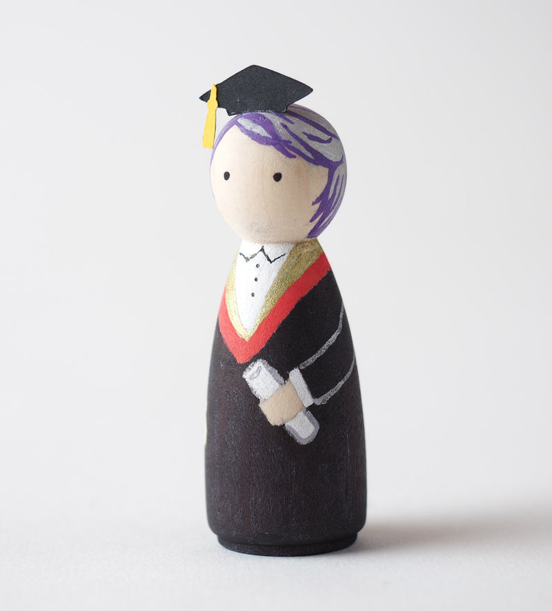 Graduation gift - Peg dolls. Give something unique and personalized.  Custom peg dolls of your family, friends, or colleagues!  They are hand-painted that show the uniqueness of each individual with their hobbies or occupations.  This will definitely touch the heart and bring smiles.  These are great for birthdays, anniversary, parent's gifts, grandparent’s gifts, retirement, graduations, communion, colleague’s going away gift, or any other occasions.