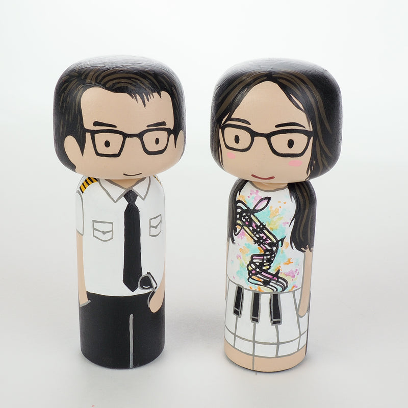 Introducing our new 2-in-1 family portrait Kokeshi dolls!  Everyone has many roles, interests, careers, personalities, and we all wear many hats in life.  Why not highlight and celebrate those in a hand-painted doll!  The toughest part is probably to choose the 2 roles you like us to paint.   Give something unique and personalized.  Customize your family, friends, or colleagues on Kokeshi dolls!  They are hand-painted with love that show the uniqueness of each individual. 