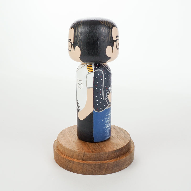 Introducing our new 2-in-1 family portrait Kokeshi dolls!  Everyone has many roles, interests, careers, personalities, and we all wear many hats in life.  Why not highlight and celebrate those in a hand-painted doll!  The toughest part is probably to choose the 2 roles you like us to paint.   Give something unique and personalized.  Customize your family, friends, or colleagues on Kokeshi dolls!  They are hand-painted with love that show the uniqueness of each individual. 