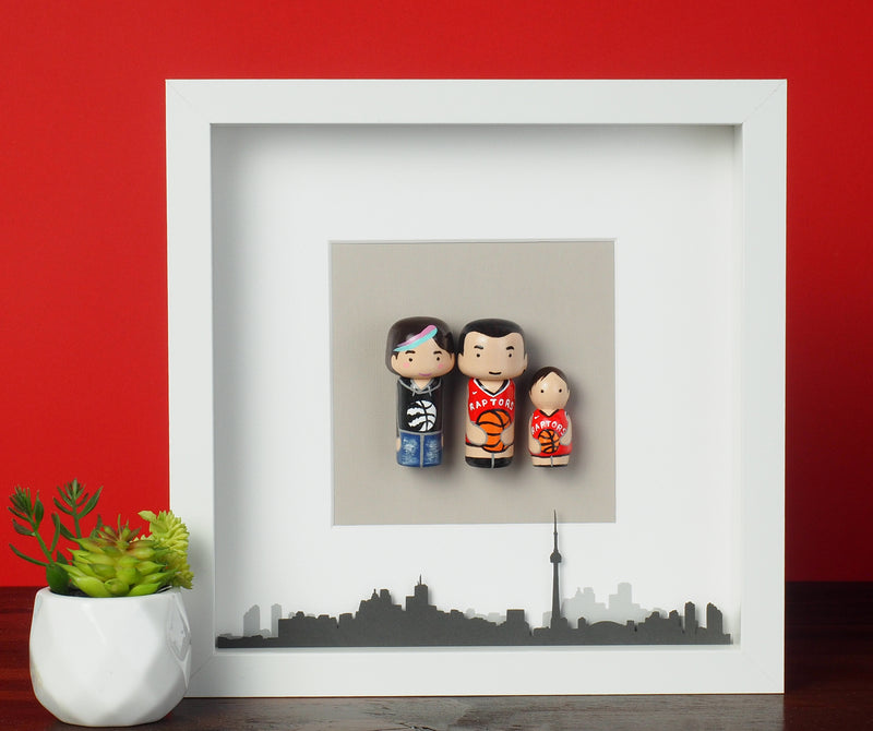 Give something unique and personalized. Custom peg dolls of your family! They are hand-painted that show the uniqueness of each individual in your family. A white shadow frame is included with the city landscape of your hometown! This will definitely touch the heart and bring smiles, may be even happy tears of your loved ones.  These are great for parents, grandparent’s gifts, birthdays, anniversary gifts, couples’ gifts, or any other occasions.
