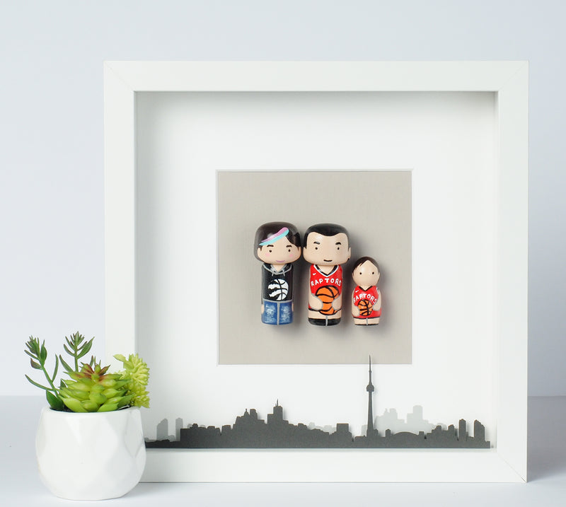 Give something unique and personalized. Custom peg dolls of your family! They are hand-painted that show the uniqueness of each individual in your family. A white shadow frame is included with the city landscape of your hometown! This will definitely touch the heart and bring smiles, may be even happy tears of your loved ones.  These are great for parents, grandparent’s gifts, birthdays, anniversary gifts, couples’ gifts, or any other occasions.