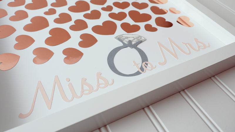 Throwing a bridal shower?  Have your guests sign a rose gold heart and preserve the beautiful memories for many years to come.  This 12"x12" Bridal shower guest book alternative consist of up to 50 hearts.  Other sizes are also available. 