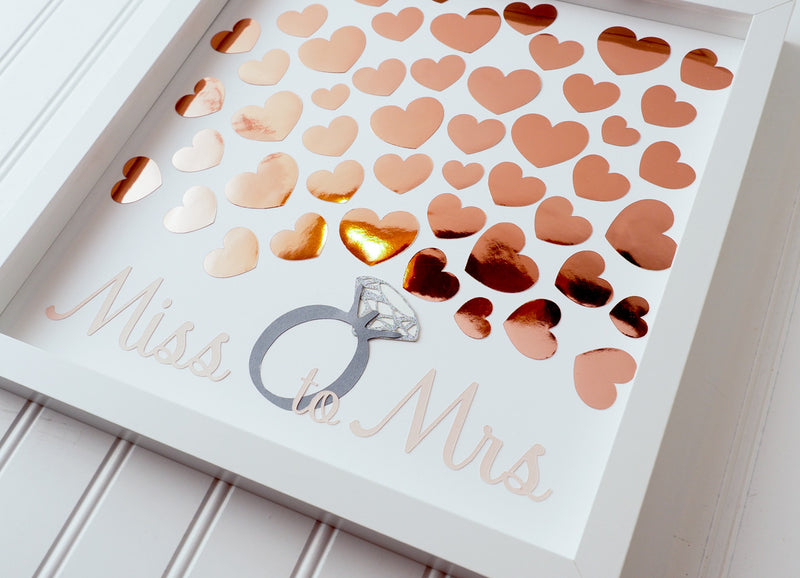 Throwing a bridal shower?  Have your guests sign a rose gold heart and preserve the beautiful memories for many years to come.  This 12"x12" Bridal shower guest book alternative consist of up to 50 hearts.  Other sizes are also available. 